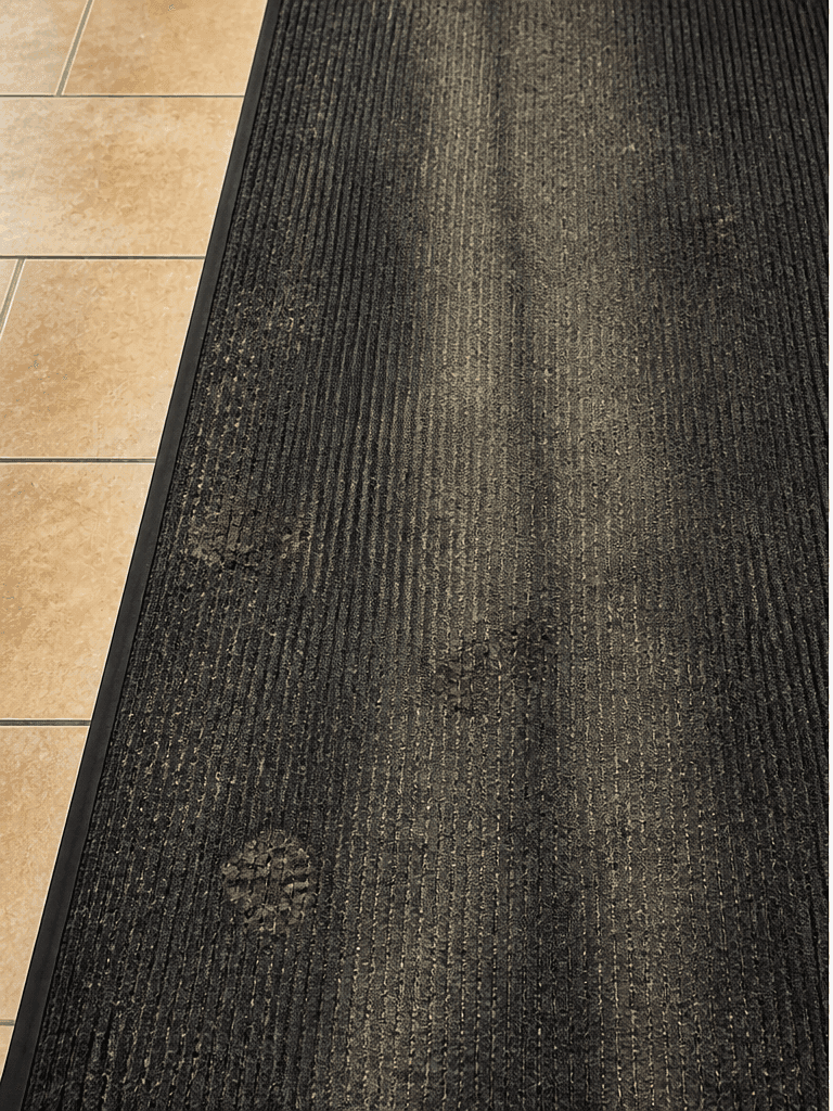Soiled carpet visual before deep cleaning