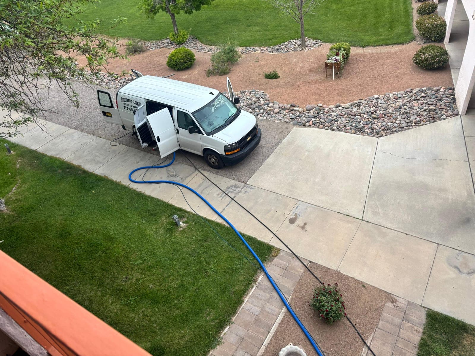 Aggie Carpet and Tile Cleaning service van on a job in Las Cruces, NM