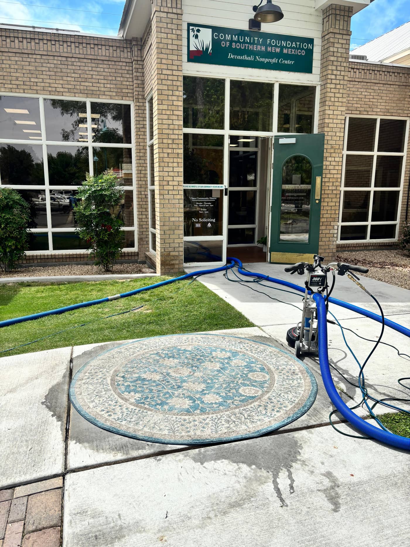 Truck-mounted commercial carpet cleaning at a Las Cruces, NM business